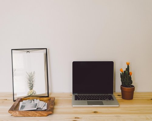 Ergonomic home office setup with comfortable seating and natural light